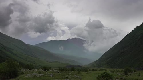 Fast Moving Dramatic Clouds in Mountains