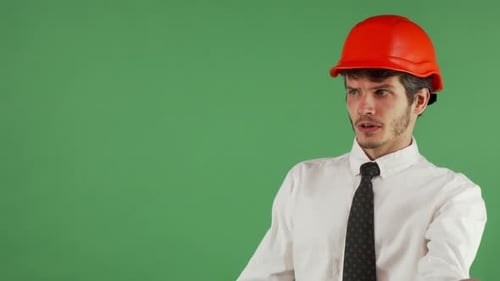 Angry Male Engineer Shouting at Someone on Chromakey