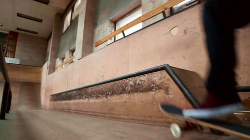 Skater Boy Enjoying Practice in Indoor Skate Park