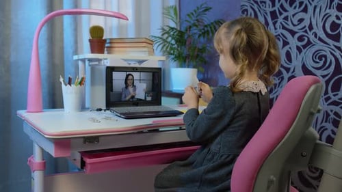 Child Attends Online Lesson at Home