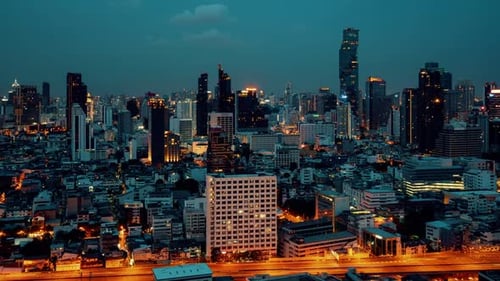 Time Lapse Night Cityscape and Highrise Buildings in Metropolis City Center