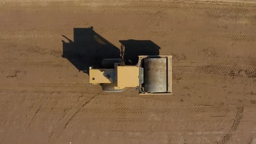 Aerial View of Road Roller Compacting Soil