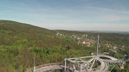 Aerial orbit over the main deck of the watch tower In the mountains