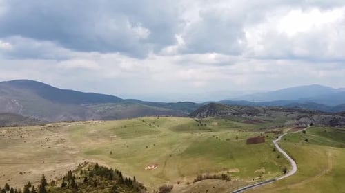 Flying over Mountain Landscape - 4 Clips Included