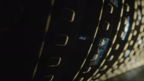 Roll of Twisted Retro Film Tape with Illuminated Perforation