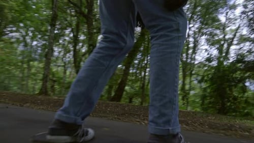 Young man skateboarding in park