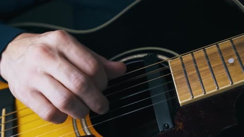 Professional Guitarist Warms Up Playing Simple Melodies