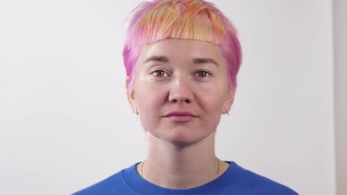 Woman Smiling, Pink and Blonde Modern Hair Style