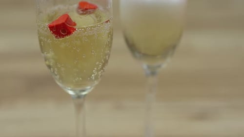 Sparkling Champagne with Red Candy Close Up