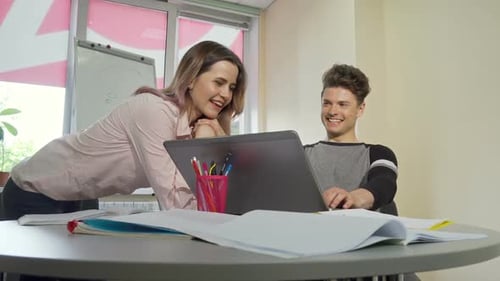 Young College Couple Enjoying Studying Together