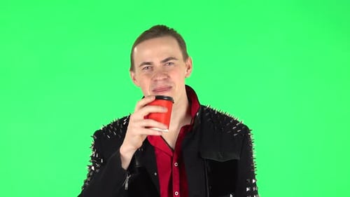 Guy Enjoying Coffee on Green Screen