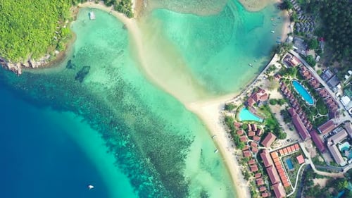 Strip of the sand, path between two islands Koh Ma and Koh Phangan with luxury hotels