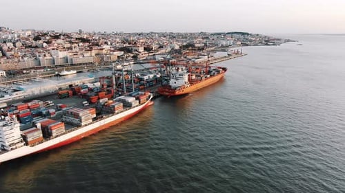 Aerial View of Large Ships Moored To Cargo Port for Loading