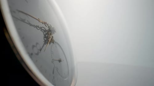 Close-Up of Clock Hands Moving in Time