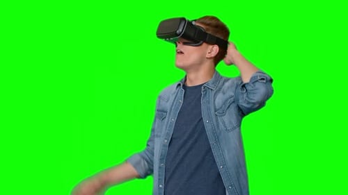 Young Adult Putting on Virtual Reality Headset