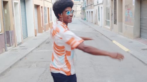 Funny Funky African American Man Happily Dancing on the Street