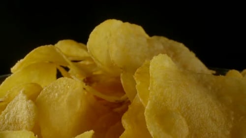 Close Up of Potato Chips in Glass Bowl