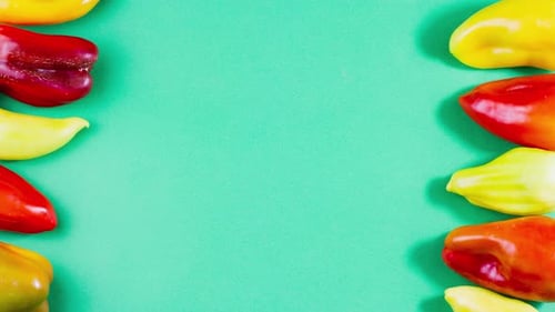 Colorful Fresh Peppers Forming a Border