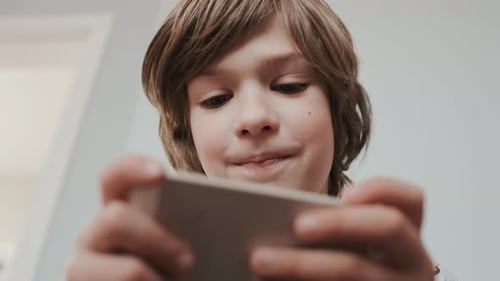 Happy Boy Play Video Games. Close-up.