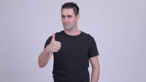 Man Gives Thumbs Up Gesture