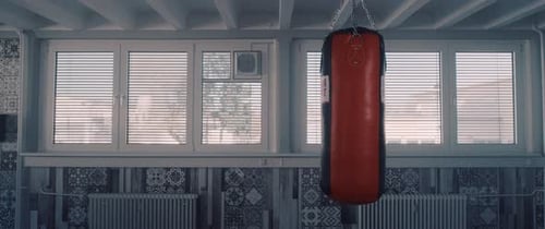 Empty Gym with Punching Bag in Daytime