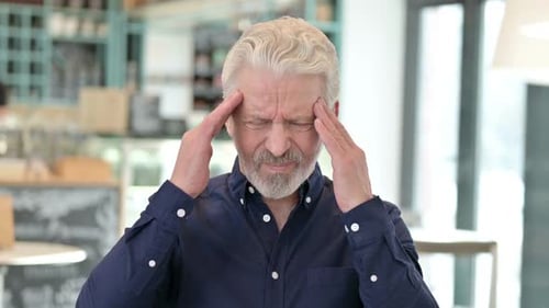 Stressful Old Man Having Headache