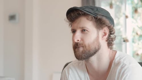 Man Playing Video Game Using Controller Indoors