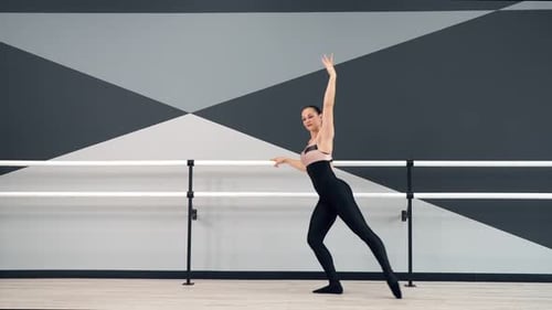 Female Dancer Training in Ballet Studio