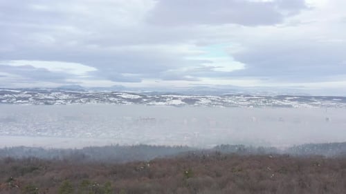 Highly polluted air above the valley 4K drone video