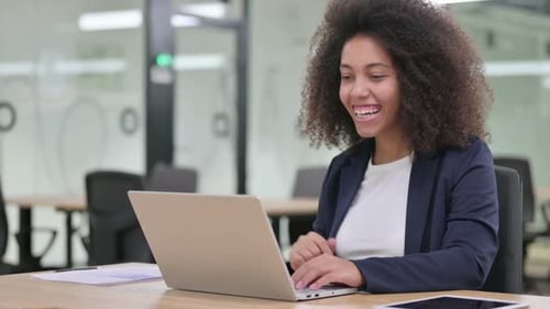 Woman on Video Conference in Bright Office