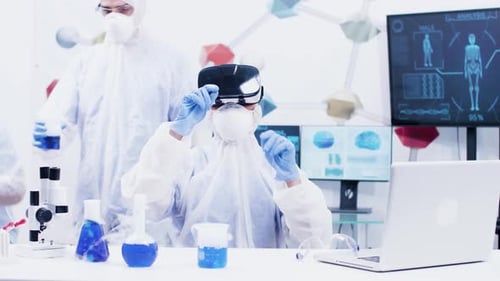 Scientist Using VR Headset in Advanced Laboratory