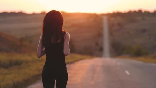 Young Fitness Woman Runner Athlete Running at Road