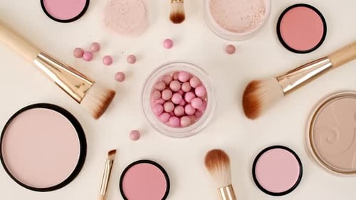 A Set of Decorative Cosmetics on Beige Background