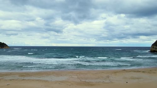 High and powerful waves coming fast to the beach, waves in winter day
