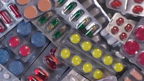 Colorful Pills and Capsules in Blister Packs