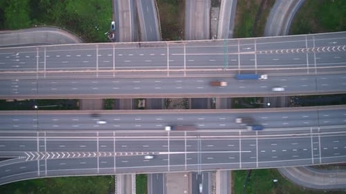 4K : Aerial Hyper lapse drone view of road junction with moving cars.
