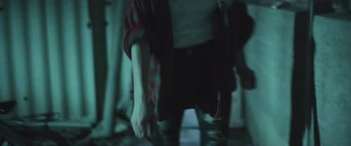 Zombie woman walking outside the building at night.Transformation zombie concept