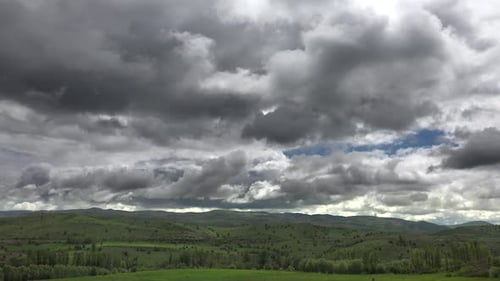 Little Village Houses Surrounded by Green Meadows and Low Hills in Standard Soft Geography