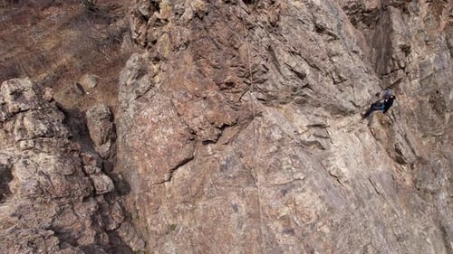 Rock Climbing Training on Steep Slope in Mountains