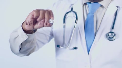 Doctor Writes Warning Message on Clear Surface