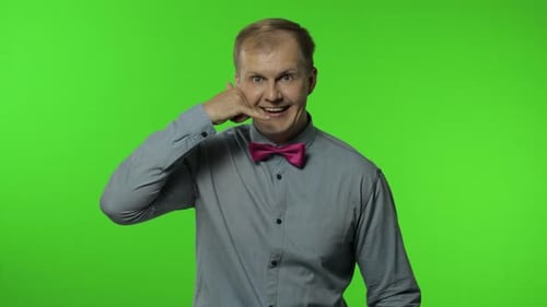 Hello, Call Me. Man with Telephone Hand Gesture Near Head and Communicate, Talk By Phone. Chroma Key