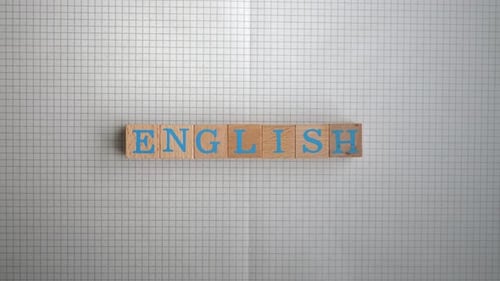 Building the Word English with Wooden Blocks