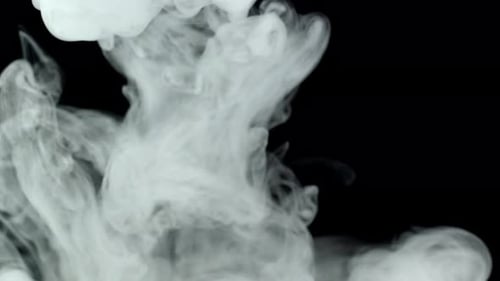 Swirling White Fog on Black Background