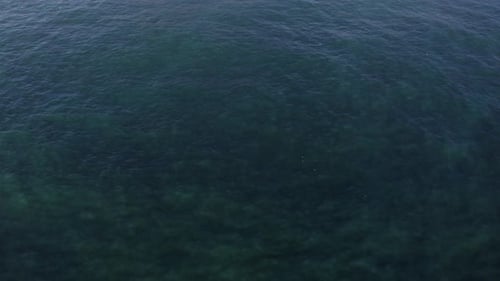 Drone Over Blue Sea Towards Coastline With Eystrahorn Mountain