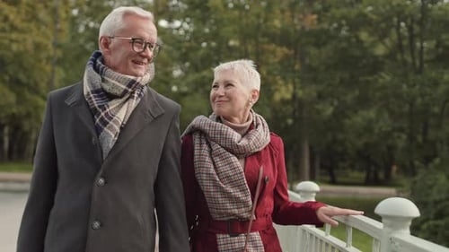 Grandparents Walking in Park