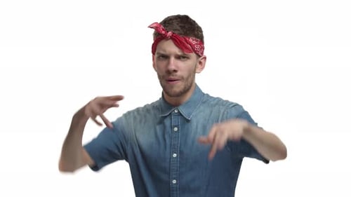 Expressive Young Adult Gesturing with Red Bandana