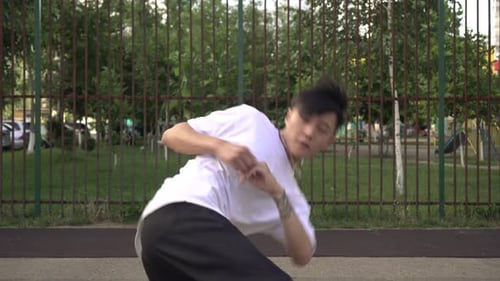 Young Man Dancing on the Hiphop Street