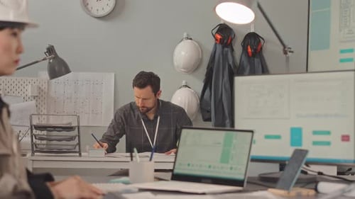 Engineering Specialists Working in Design Office