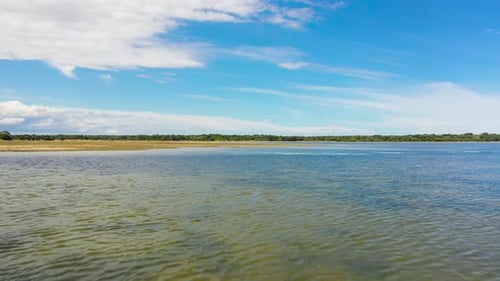 Tropical Landscape with a Lake