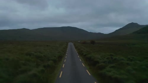 Forwards Fly Above Narrow Country Road Leading on Old Stone Bridge Over Stream